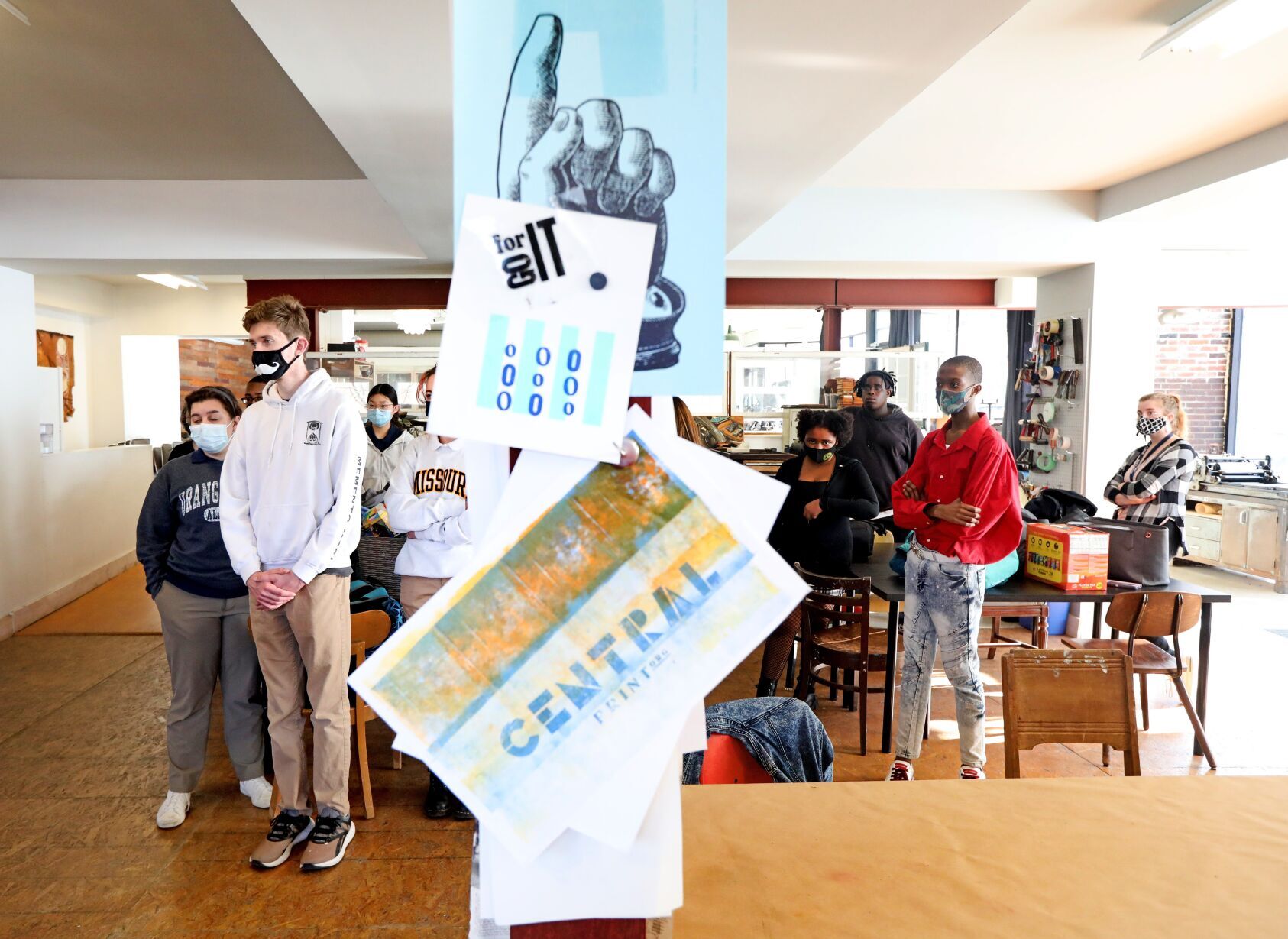 Student Magazine Staff Create Covers Outside Literary Magazine